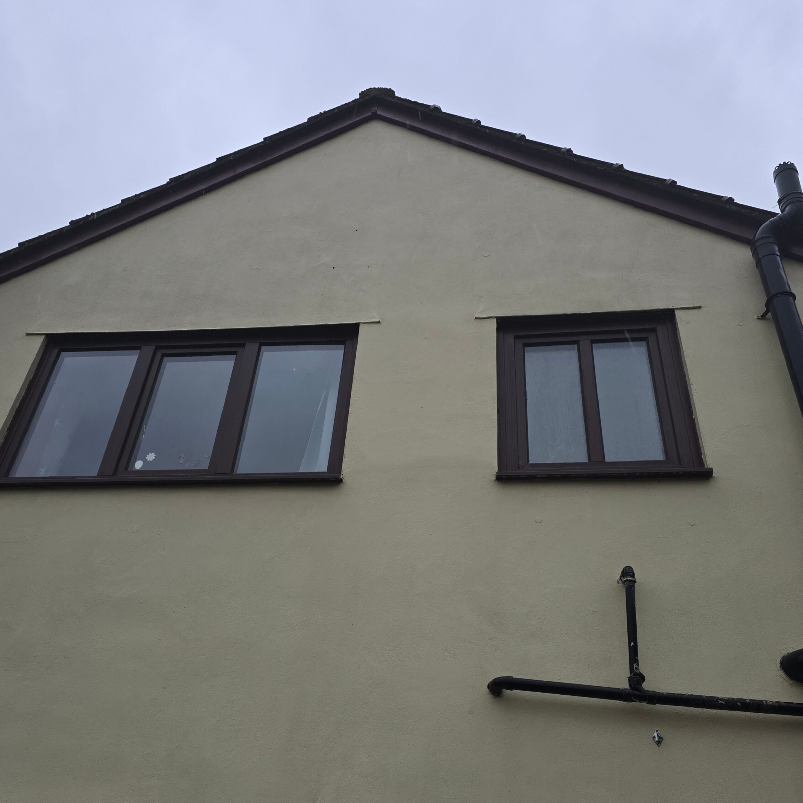 Rendered house after render cleaning in Newport